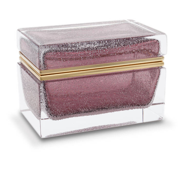 This is a picture of an intricately designed piece of Murano glass, likely originating from the Venetian glassmaking tradition. The item appears to be a box or container with a lid, featuring a pinkish hue that may have been achieved through the use of metallic oxides. The surface texture has a speckled effect, reminiscent of tiny crystals embedded within the glass. The craftsmanship suggests that this is a high-quality piece, possibly handblown by skilled artisans at Alessandro Mandruzzato, as indicated by the text associated with the image. Murano glass is renowned for its unique patterns and colors, often achieved through complex techniques such as the use of cane, incalmo, or sommerso methods. This particular item showcases a combination of these techniques, making it an attractive decorative piece. The image itself has been optimized for Google Search Engine with keywords such as 