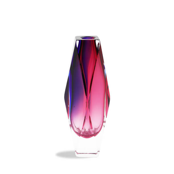 The image features a beautiful piece of Murano glass art. This particular item is a vase, crafted with the intricate techniques that are characteristic of this Venetian glassmaking tradition. The vase exhibits a vibrant blend of colors, with hues of pink and purple swirling within its form, reminiscent of the famous 