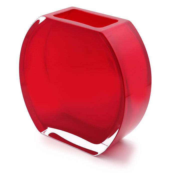 The image shows a square-shaped, red glass vase with a glossy finish. It appears to be made from Murano glass, which is known for its intricate designs and vibrant colors. The vase has flat sides and corners, giving it a modern and minimalist look. The base of the vase has a slightly wider and flatter design, providing stability when placed on a surface. The color is consistent throughout the body of the vase, and there are no visible patterns or decorations on the exterior. Keywords: Murano glass, glass vase, square vase, red glass, minimalist design, modern style, Italian craftsmanship, Venice glass, handmade, decorative item, home decor, artisanal glassware.