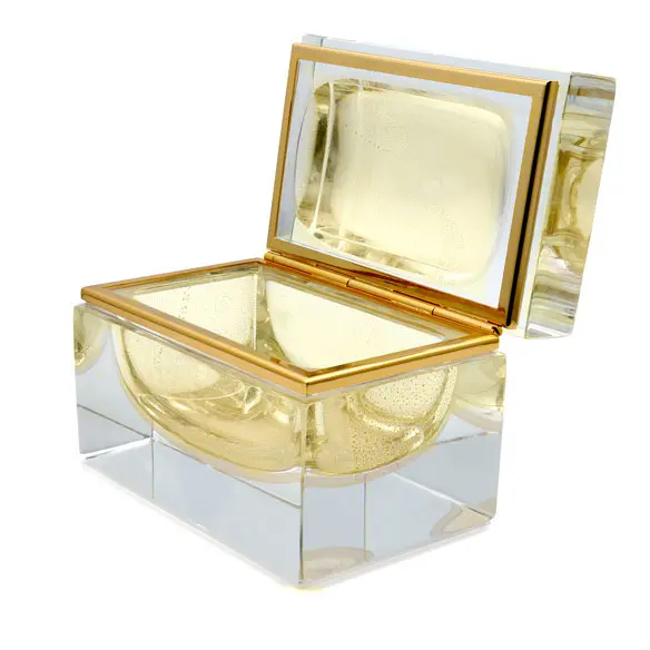 Golden Murano jewelry box showcasing the rich tradition of glass blowing in Murano.